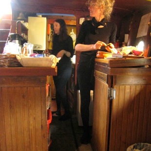Sarah and Liz making lunch in the galley - which is much tinier than it looks here!